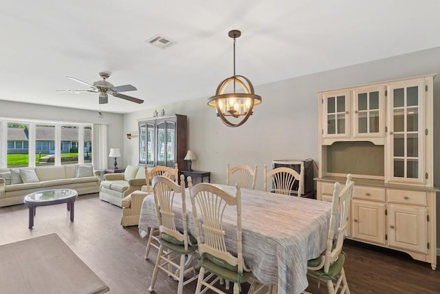 96 Enfield Ct Unit B, Ridge, NY 11961 - dining space with a chandelier, dark wood finished floors, and ceiling fan