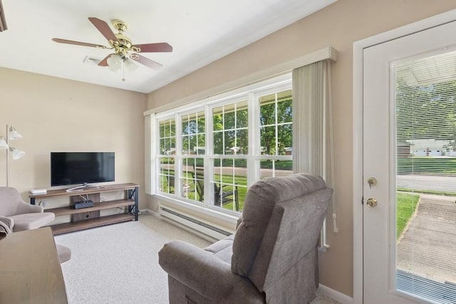 96 Enfield Ct Unit B, Ridge, NY 11961 - carpeted living area featuring a baseboard radiator and a ceiling fan