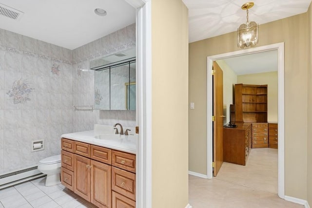 96 Enfield Ct Unit B, Ridge, NY 11961 - full bathroom featuring a baseboard heating unit, vanity, and tile patterned flooring