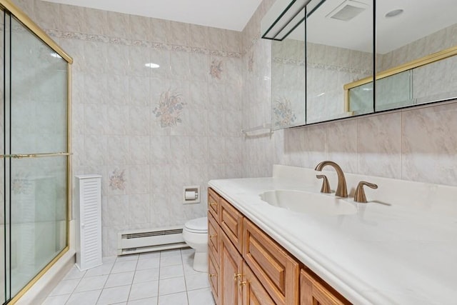 96 Enfield Ct Unit B, Ridge, NY 11961 - bathroom with a baseboard radiator, tile walls, tile patterned flooring, vanity, and a stall shower