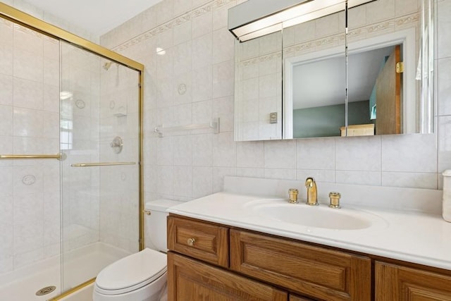96 Enfield Ct Unit B, Ridge, NY 11961 - full bath with tile walls, a shower stall, vanity, and decorative backsplash