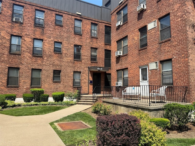 21528 47th Ave Unit 3B, Bayside, NY 11361 - view of apartment building / complex with cooling unit