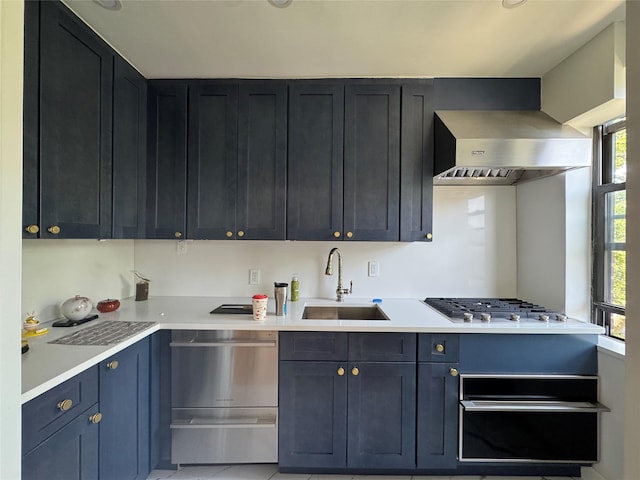 21528 47th Ave Unit 3B, Bayside, NY 11361 - kitchen featuring wall chimney exhaust hood, light countertops, stainless steel appliances, and light tile patterned flooring