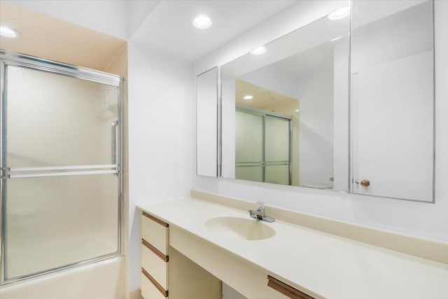 531 Heritage Hls Unit B, Somers, NY 10589 - full bath featuring vanity, recessed lighting, and shower / bath combination with glass door