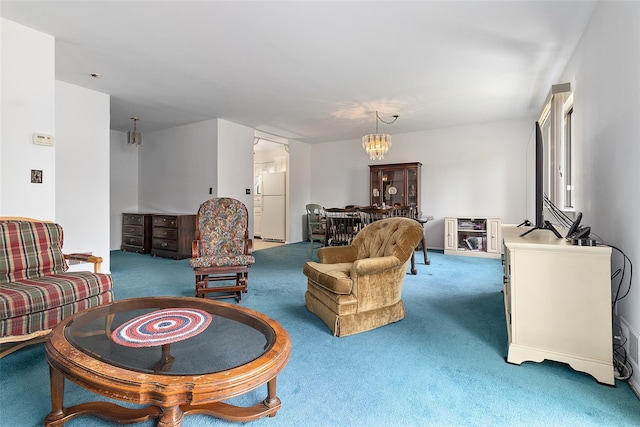 84 Molly Pitcher Ln Unit H, Yorktown Heights, NY 10598 - living room featuring carpet floors and a chandelier