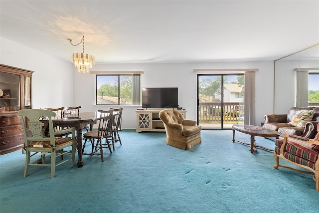 84 Molly Pitcher Ln Unit H, Yorktown Heights, NY 10598 - living area featuring healthy amount of natural light, a chandelier, and carpet floors