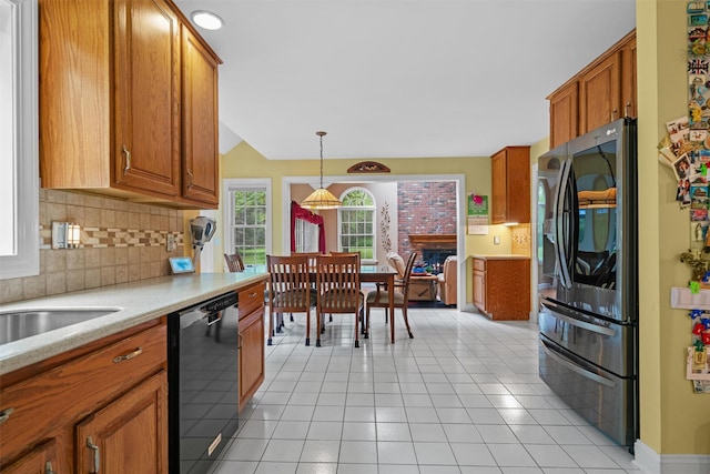 24 Hampton Ct, Wallkill, NY 12589 - kitchen featuring stainless steel fridge with ice dispenser, black dishwasher, backsplash, and brown cabinets