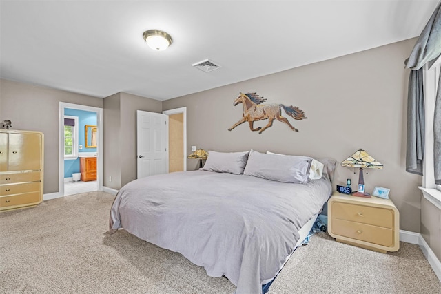 24 Hampton Ct, Wallkill, NY 12589 - carpeted bedroom with baseboards and ensuite bath