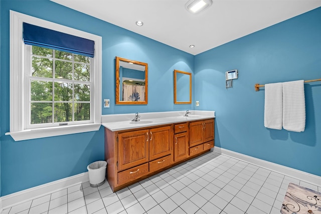 24 Hampton Ct, Wallkill, NY 12589 - bathroom featuring double vanity and tile patterned flooring