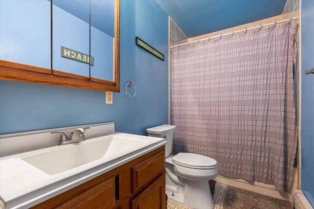 76 Maureen Dr, Middletown, NY 10940 - full bathroom with vanity, a baseboard radiator, and a shower with curtain