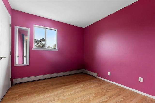 76 Maureen Dr, Middletown, NY 10940 - unfurnished room with a baseboard radiator and light wood-style flooring
