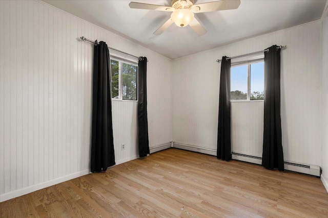 76 Maureen Dr, Middletown, NY 10940 - spare room featuring light wood finished floors, a ceiling fan, and a baseboard radiator