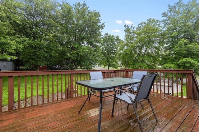 76 Maureen Dr, Middletown, NY 10940 - wooden deck featuring outdoor dining area, a shed, and a lawn