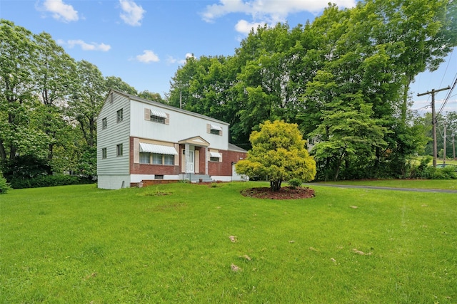 4 Westbrook Dr, Cortlandt Manor, NY 10567 - view of front of house featuring a front lawn