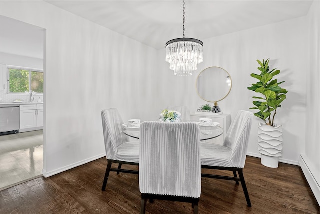 4 Westbrook Dr, Cortlandt Manor, NY 10567 - dining space with a baseboard radiator, wood finished floors, and a chandelier