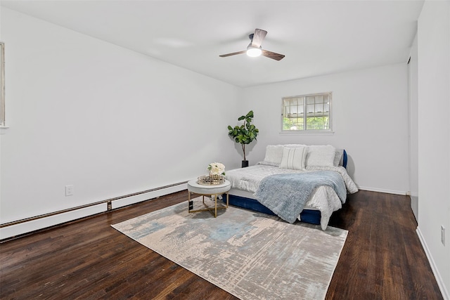 4 Westbrook Dr, Cortlandt Manor, NY 10567 - bedroom featuring baseboard heating, wood finished floors, and a ceiling fan