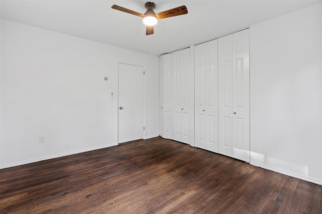 4 Westbrook Dr, Cortlandt Manor, NY 10567 - unfurnished bedroom with dark wood-type flooring, two closets, and a ceiling fan