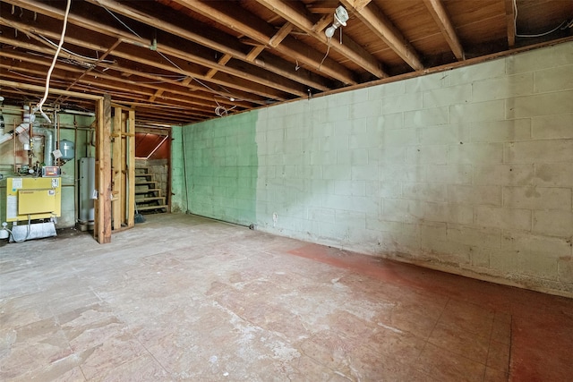 4 Westbrook Dr, Cortlandt Manor, NY 10567 - unfinished basement with stairs, gas water heater, and a heating unit