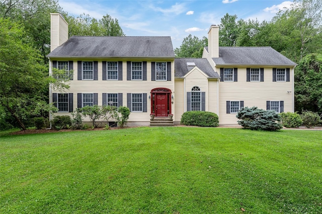 4 Scenic Dr, South Salem, NY 10590 - colonial home featuring a chimney and a front lawn