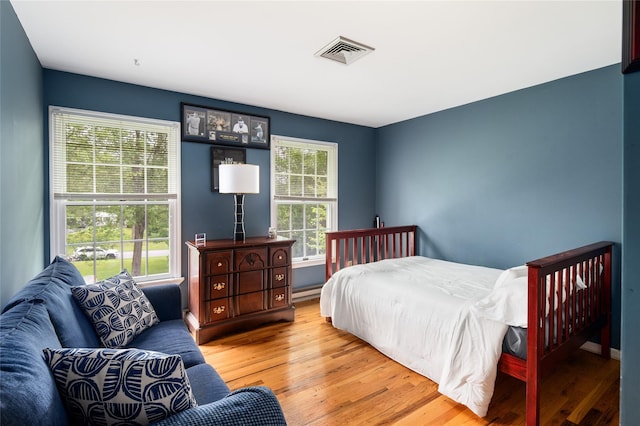 4 Scenic Dr, South Salem, NY 10590 - bedroom with hardwood / wood-style flooring and a baseboard heating unit