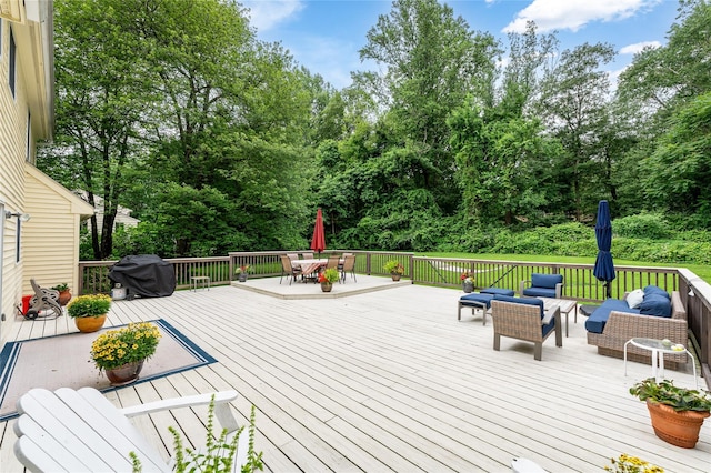 4 Scenic Dr, South Salem, NY 10590 - wooden deck with outdoor lounge area, outdoor dining space, area for grilling, and view of wooded area