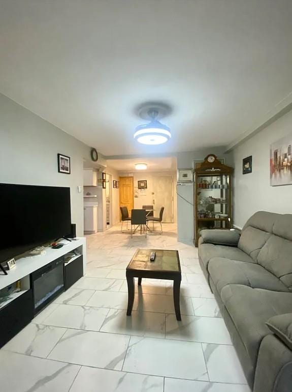 22-39 74th St, East Elmhurst, NY 11370 - living area with light marble finish flooring
