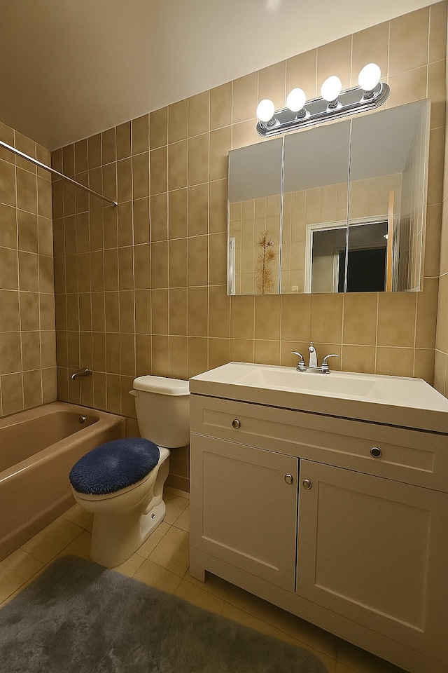 22-39 74th St, East Elmhurst, NY 11370 - bathroom featuring tile patterned floors, vanity, tile walls, and  shower combination