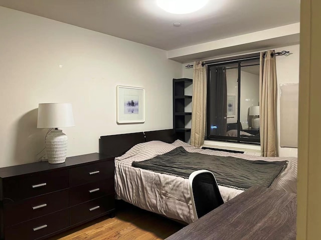 132-35 41st Rd Unit 14B, Flushing, NY 11355 - bedroom featuring light wood-style floors