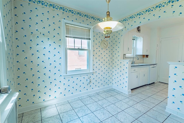147 Nugent St, New Hyde Park, NY 11040 - unfurnished dining area with ornamental molding, wallpapered walls, and light tile patterned floors