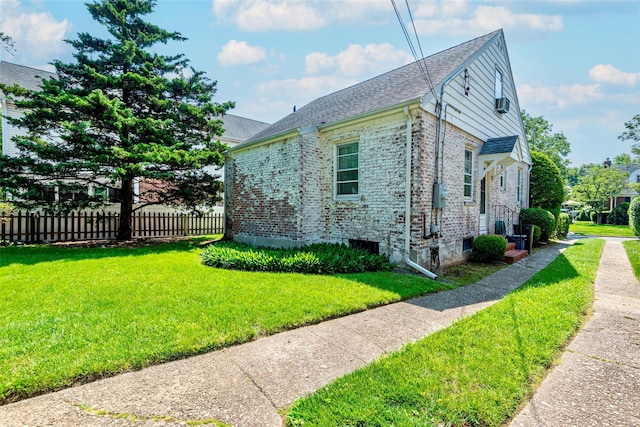 147 Nugent St, New Hyde Park, NY 11040 - view of home's exterior featuring brick siding and a shingled roof