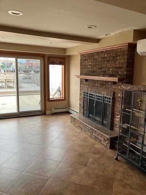 16330 95th St, Howard Beach, NY 11414 - unfurnished living room with a wall mounted air conditioner, a baseboard radiator, a fireplace, recessed lighting, and tile patterned flooring