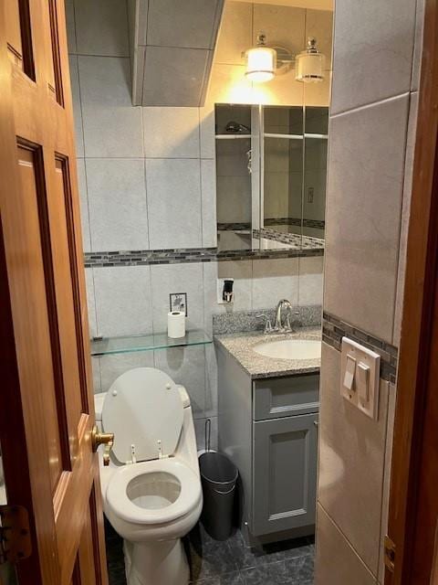 16330 95th St, Howard Beach, NY 11414 - half bath featuring tile walls and vanity