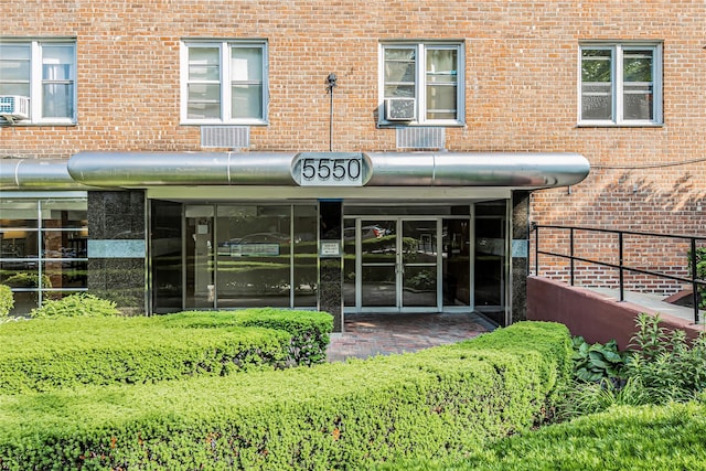 5550 Fieldstone Rd Unit 1C, Bronx, NY 10471 - doorway to property with brick siding