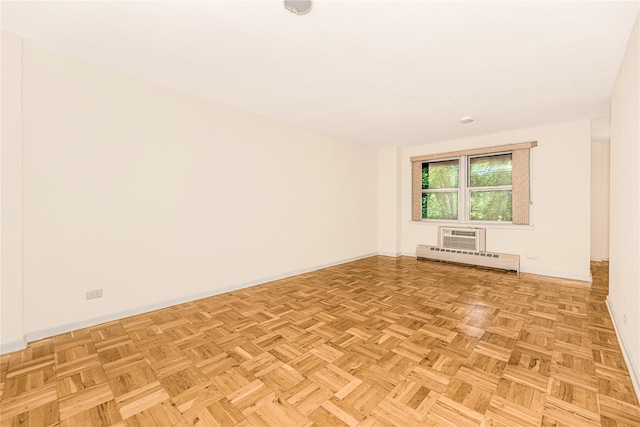 5550 Fieldstone Rd Unit 1C, Bronx, NY 10471 - spare room with baseboards and a baseboard heating unit