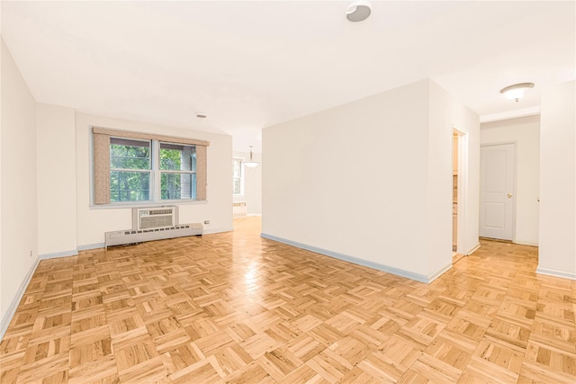 5550 Fieldstone Rd Unit 1C, Bronx, NY 10471 - empty room featuring a baseboard heating unit and a wall mounted AC