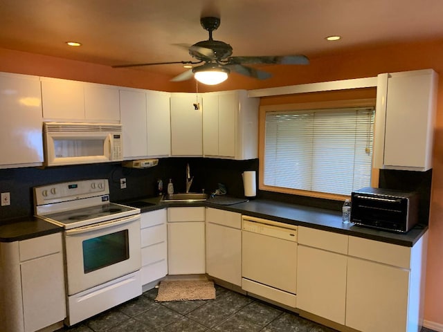 231 Willowood Dr, Wantagh, NY 11793 - kitchen featuring white appliances, dark countertops, ceiling fan, white cabinetry, and recessed lighting