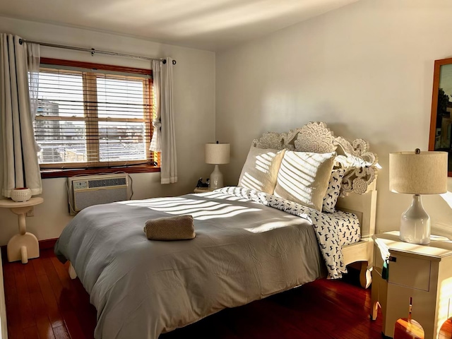 53-10 90th St Unit 4B, Elmhurst, NY 11373 - bedroom with hardwood / wood-style flooring and an AC wall unit