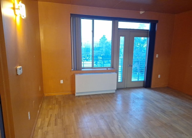 715 Fox St Unit 5J, Bronx, NY 10455 - entryway featuring radiator and wood finished floors