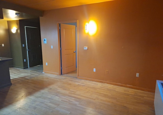 715 Fox St Unit 5J, Bronx, NY 10455 - unfurnished room with light wood-style floors and baseboards