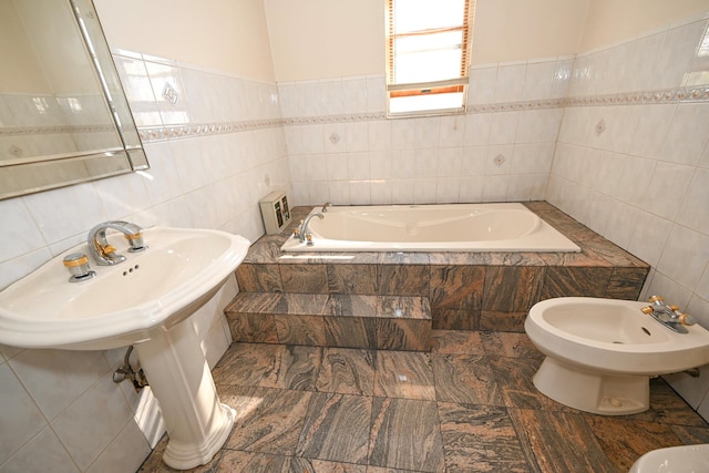 5920 69th Pl, Maspeth, NY 11378 - full bathroom with tile walls, a bidet, and a garden tub