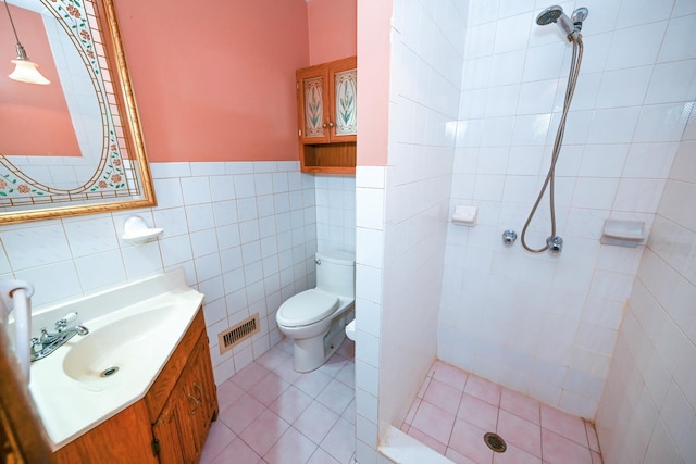 5920 69th Pl, Maspeth, NY 11378 - bathroom with a stall shower, tile walls, vanity, wainscoting, and tile patterned flooring