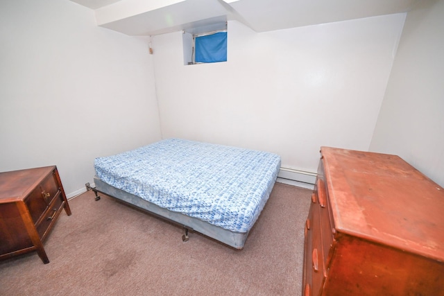 5920 69th Pl, Maspeth, NY 11378 - carpeted bedroom with a baseboard heating unit and baseboards