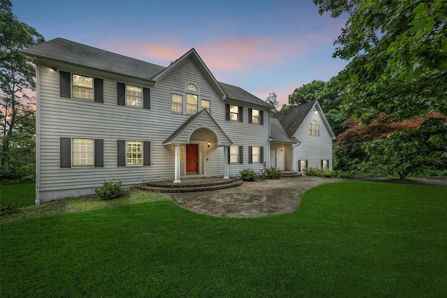 16 Apple Summit Ln, Lagrangeville, NY 12540 - colonial inspired home with a front yard and roof with shingles