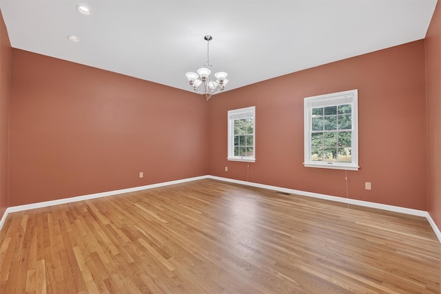 16 Apple Summit Ln, Lagrangeville, NY 12540 - unfurnished room featuring light wood-style floors, a chandelier, and recessed lighting