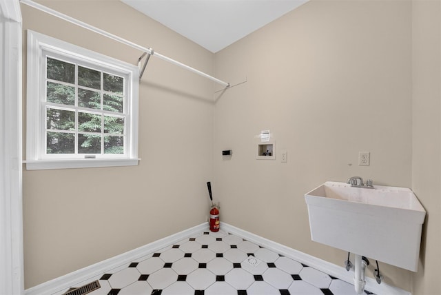 16 Apple Summit Ln, Lagrangeville, NY 12540 - washroom with washer hookup and tile patterned floors