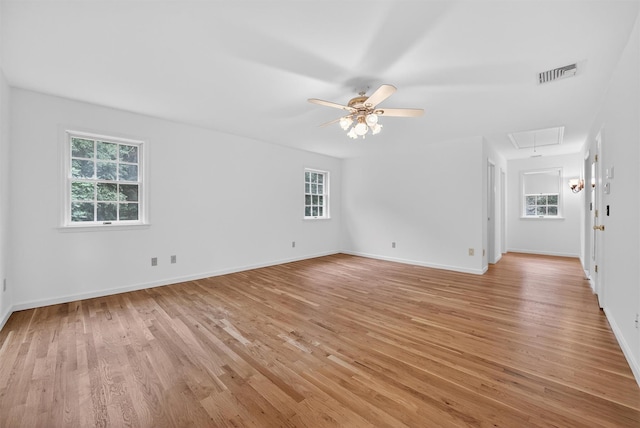 16 Apple Summit Ln, Lagrangeville, NY 12540 - spare room featuring attic access, healthy amount of natural light, and light wood-style flooring