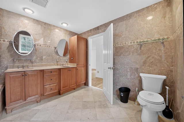 16 Apple Summit Ln, Lagrangeville, NY 12540 - bathroom featuring tile walls and double vanity