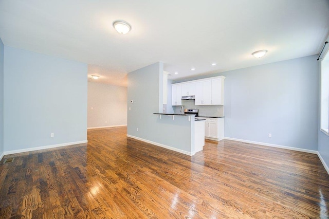31 Pinto Rd W, Middletown, NY 10941 - unfurnished living room featuring wood finished floors and recessed lighting