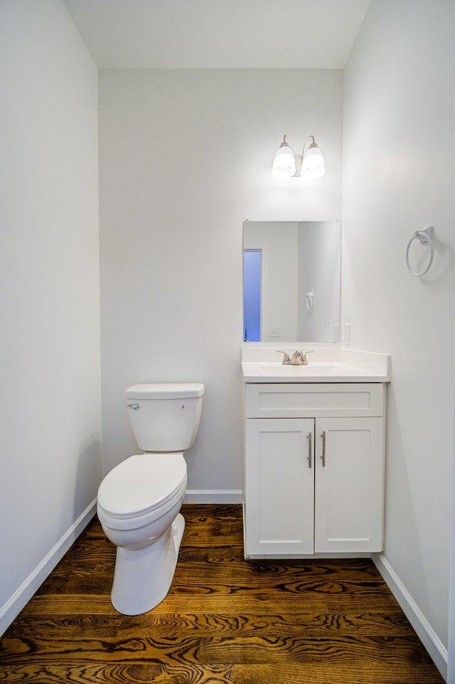 31 Pinto Rd W, Middletown, NY 10941 - half bathroom featuring vanity and wood finished floors