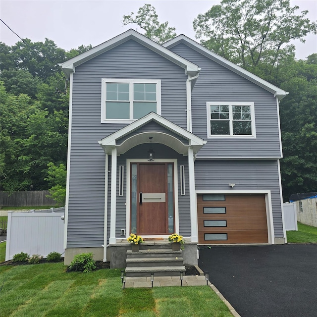 105 Valley Rd, White Plains, NY 10604 - view of front of home with an attached garage, asphalt driveway, and entry steps